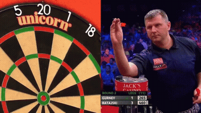 Man Holding Dart In Front Of Unicorn Dart Board GIF