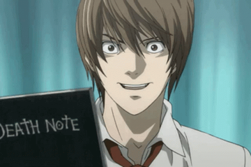 Man Holding Death Note Book GIF