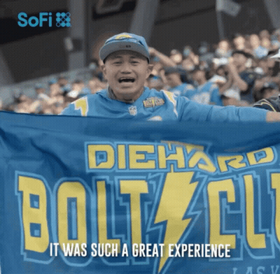 Man Holding Diehard Bolts Flag In Crowd GIF
