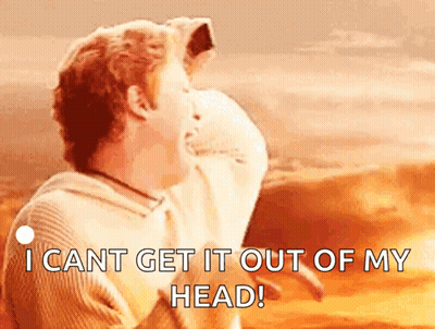 Man Holding Dog Saying I Cant Get It Out Of My Head GIF