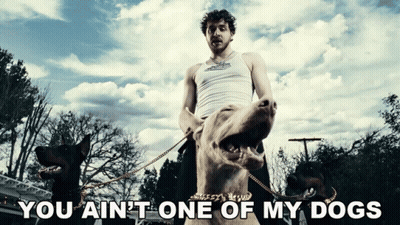 Man Holding Dog With You Ain't One Of My Dogs GIF