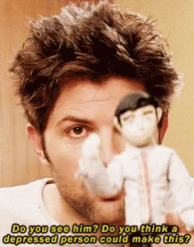 Man Holding Doll Saying Do You See Him GIF