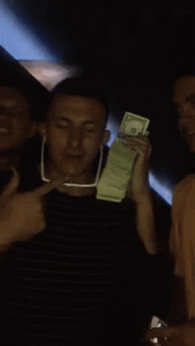 Man Holding Dollars Next To Man In Sunglasses GIF