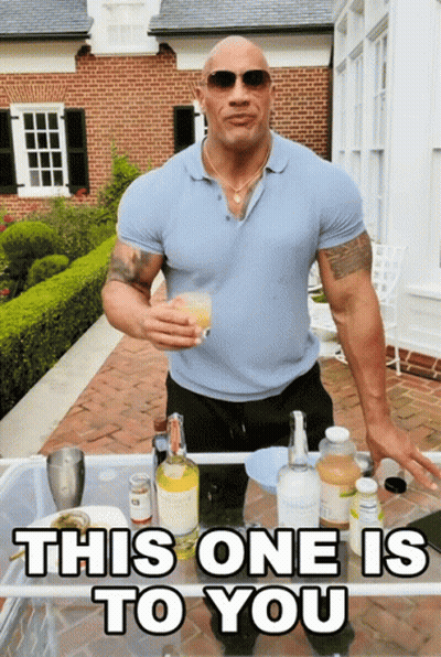 Man Holding Drink Saying This One Is To You GIF
