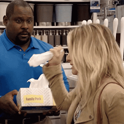 Man Holding Family Pack Tissues Woman Wiping Face
