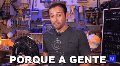 Man Holding Fan Beside Sign Dizendo Porque A Gente GIF