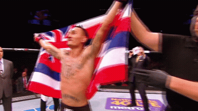 Man Holding Flag In Boxing Ring GIF