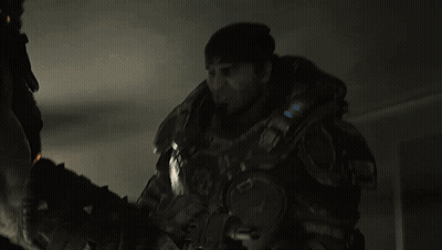 Man Holding Flamethrower With V On Hat GIF