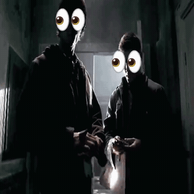 Man Holding Flashlight And Another Man With Googly Eyes GIF