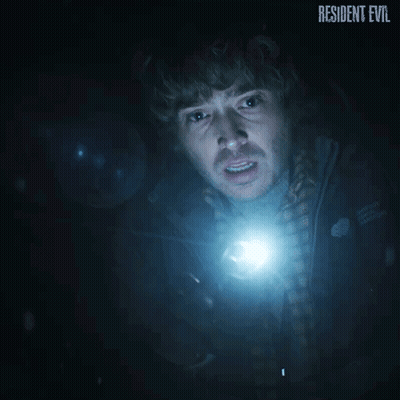 Man Holding Flashlight In Dark Room Resident Evil GIF