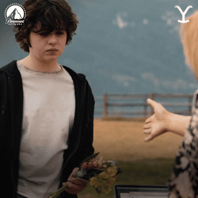 Man Holding Flowers And Paramount Network Logo GIF