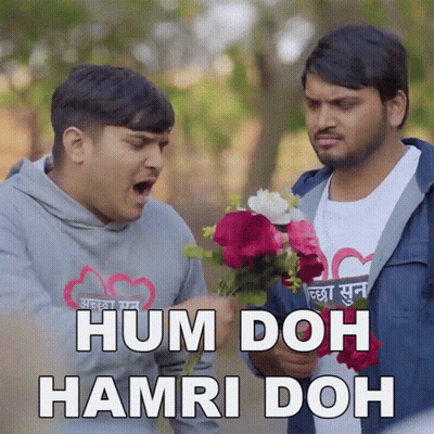 Man Holding Flowers With Hum Doh Hamri Doh GIF