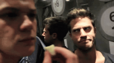 Man Holding Food In Front Of 18 Sign GIF
