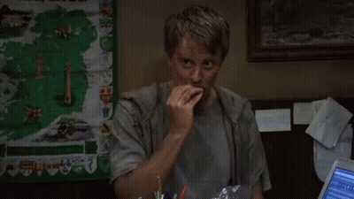 Man Holding Food In Front Of Ireland Map GIF