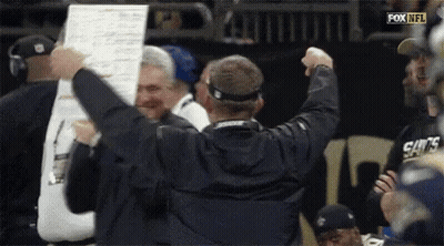 Man Holding Fox NFL Sign GIF