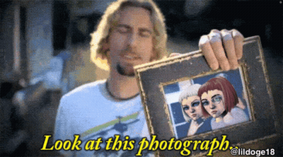 Man Holding Framed Picture Saying Look At This Photograph GIF