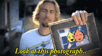 Man Holding Framed Picture Saying Look At This Photograph GIF