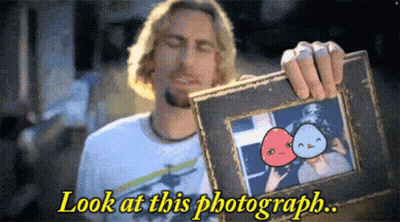 Man Holding Framed Picture Saying Look At This Photograph GIF