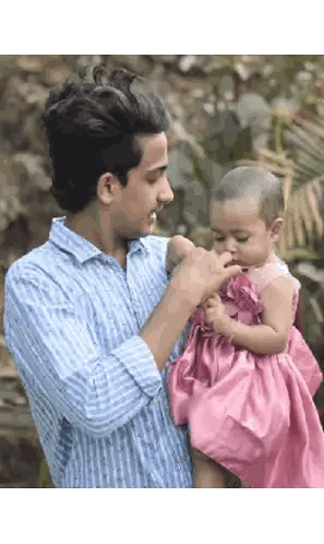 Man Holding Girl In Pink Dress Sticker