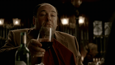 Man Holding Glass Of Red Wine GIF