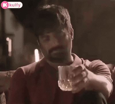 Man Holding Glass Of Whiskey GIF