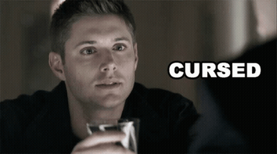 Man Holding Glass With Cursed GIF