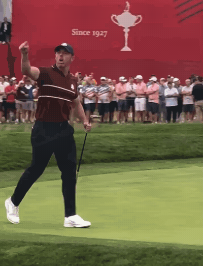 Man Holding Golf Club In Front Of Since 1927 Sign GIF