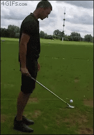 Man Holding Golf Club On Course GIF