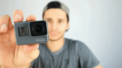 Man Holding GoPro Camera
