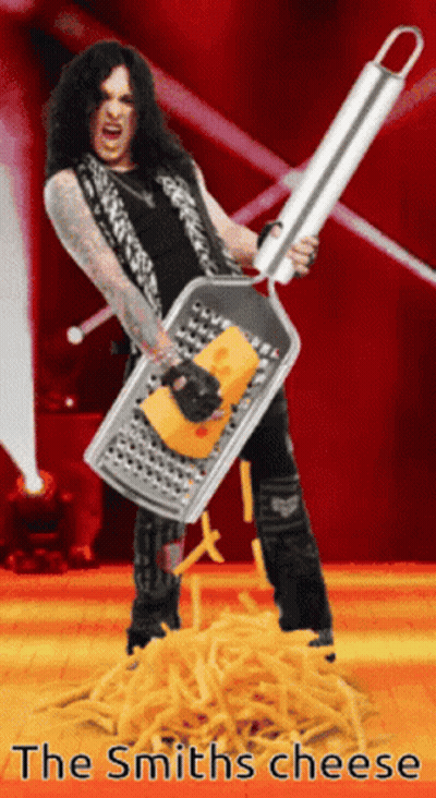 Man Holding Grater With Cheese Saying The Smiths Cheese GIF