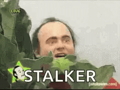 Man Holding Green Leaf In Mouth GIF