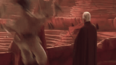 Man Holding Green Lightsaber And Man Holding Red Lightsaber GIF
