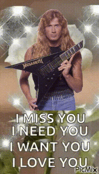 Man Holding Guitar Megadeth
