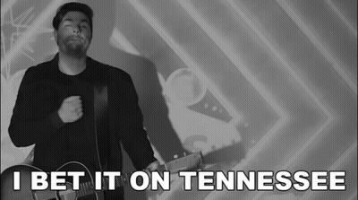 Man Holding Guitar Saying I Bet It On Tennessee GIF