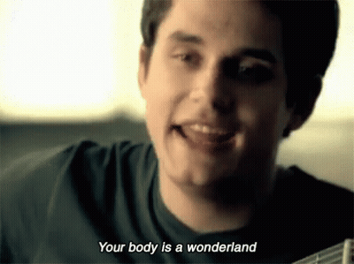 Man Holding Guitar Smiling Saying Your Body Is A Wonderland GIF