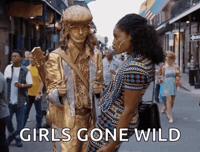 Man Holding Guitar Statue Woman Girls Gone Wild GIF