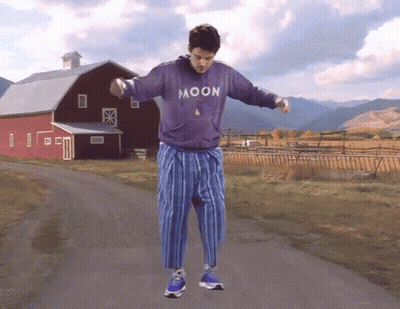 Man Holding Guitar Wearing Moon Shirt GIF