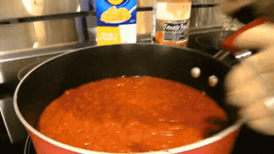 Man Holding Gummy Kraft Mac And Cheese Behind Him GIF