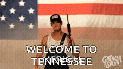 Man Holding Gun American Flag Welcome To Tennessee GIF