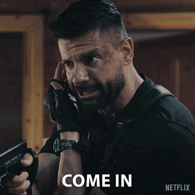 Man Holding Gun Come In GIF