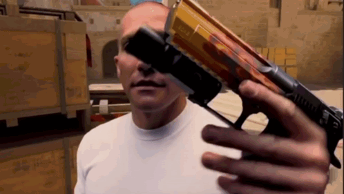 Man Holding Gun GIF