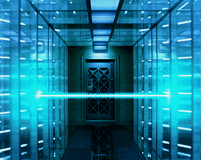 Man Holding Gun In Front Of Door With Giantmonster GIF