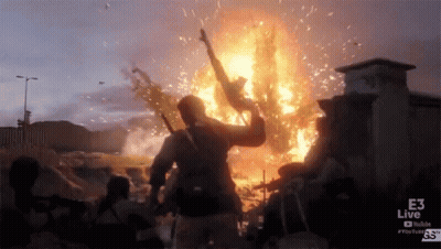 Man Holding Gun In Front Of Explosion With E3 Live Logo GIF