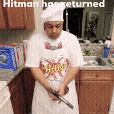 Man Holding Gun In Kitchen Hitman Has Returned GIF
