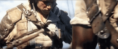 Man Holding Gun Next To Another Man GIF