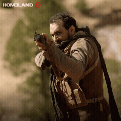 Man Holding Gun Saying Homeland GIF