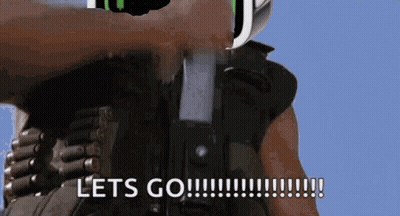 Man Holding Gun Saying Let's Go GIF