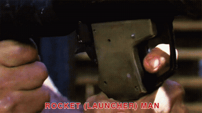 Man Holding Gun Saying Rocket Launcher Man GIF