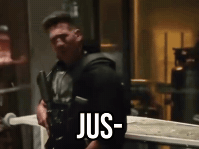 Man Holding Gun Says Jus GIF