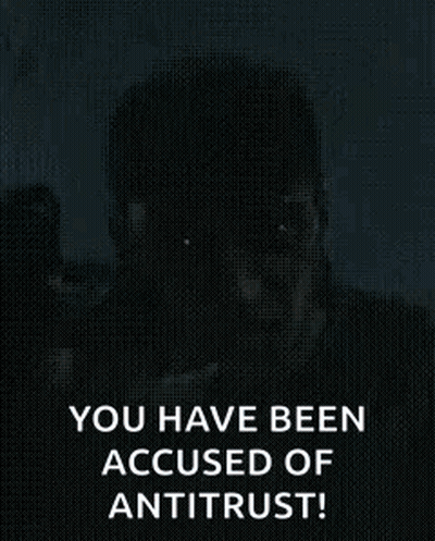 Man Holding Gun Says You Have Been Accused Of Antitrust! GIF